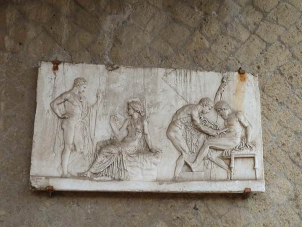 Ins. Orientalis I, 2, Herculaneum, September 2015. Plaster cast of the relief showing the myth of Telephus, son of Hercules. However, this copy of the original now in Naples Archaeological Museum, was not found in this location, but in one of the rear rooms.